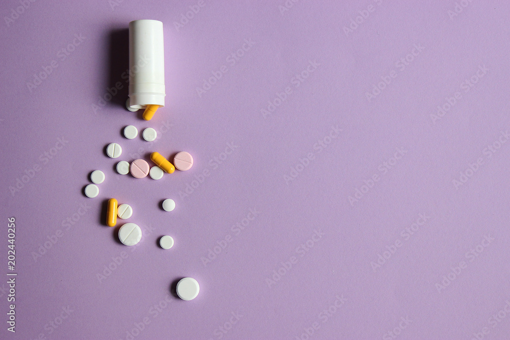 pills on a pastel background. composition for design in the style of minimalism. concept of health. top pills on a pastel background. composition for design in the style of minimalism. concept of health. top