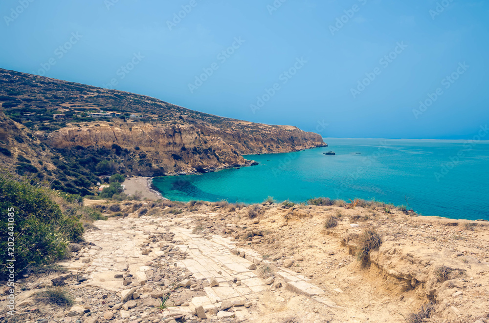Komos, the beautiful long sandy isolated  beach of southern Crete which has been awarded  by forbes as the best beach of the world.The protected  sea turtles (Caretta caretta) lay their eggs there.