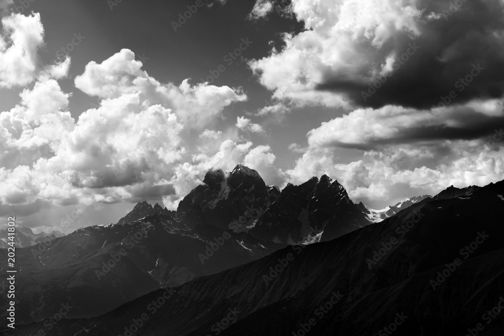 Fototapeta Black and white view on summer mounts at evening