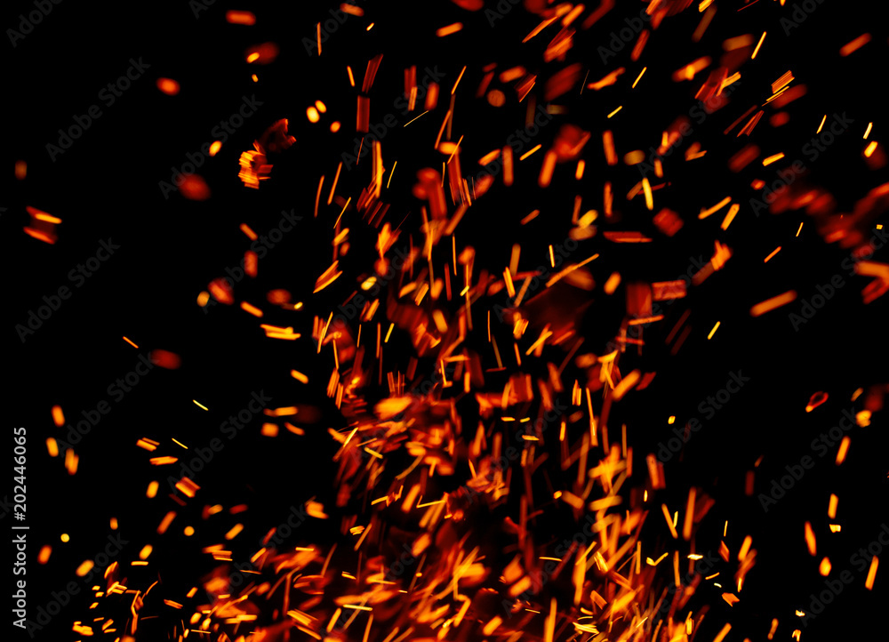flame of fire with sparks on a black background flame of fire with sparks on a black background