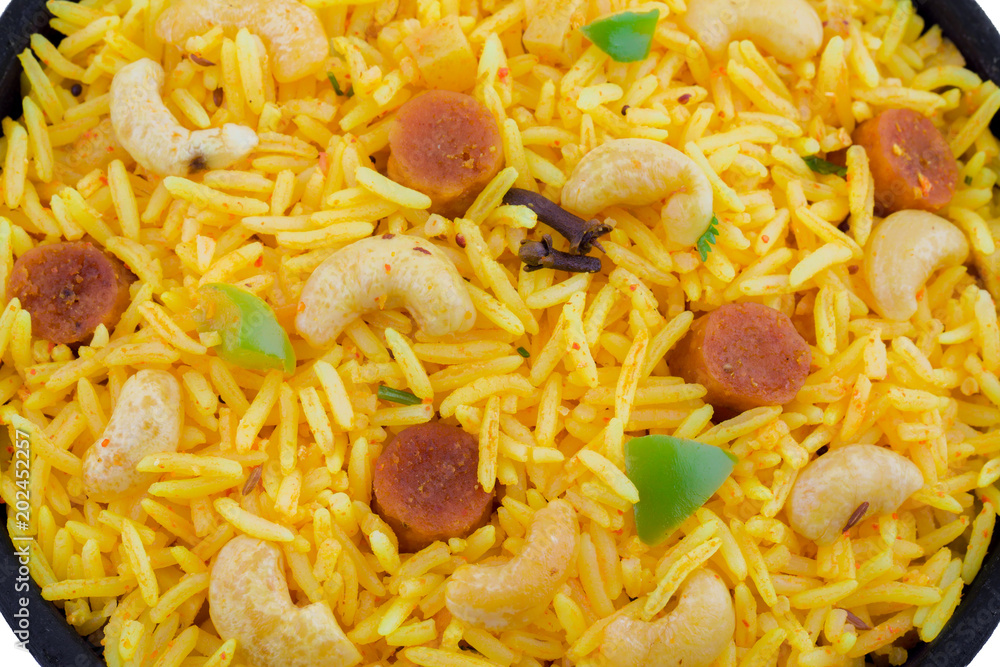 Indian Cuisine Pulao Also Know as Pulav, Vegetarian Biryani, Veg Pulav, Vegetable Pulav, Biriyani or Vegetable Rice is a Spicy Rice Dish Prepared By Cooking Rice with Various Vegetables And Spices Indian Cuisine Pulao Also Know as Pulav, Vegetarian Biryani, Veg Pulav, Vegetable Pulav, Biriyani or Vegetable Rice is a Spicy Rice Dish Prepared By Cooking Rice with Various Vegetables And Spices
