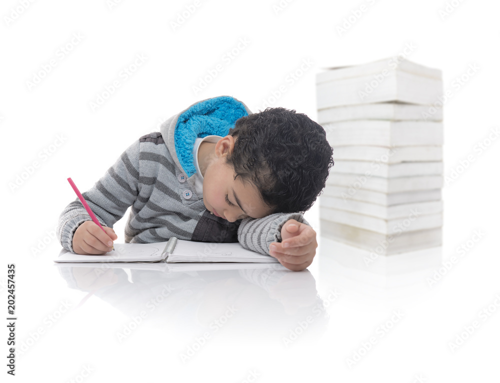Young Boy Tired Studying, and Books