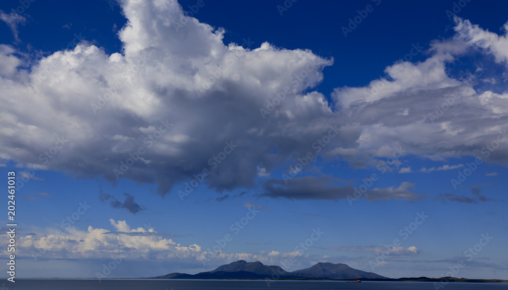 Blue sky and clouds - Vega island in Northern Norway