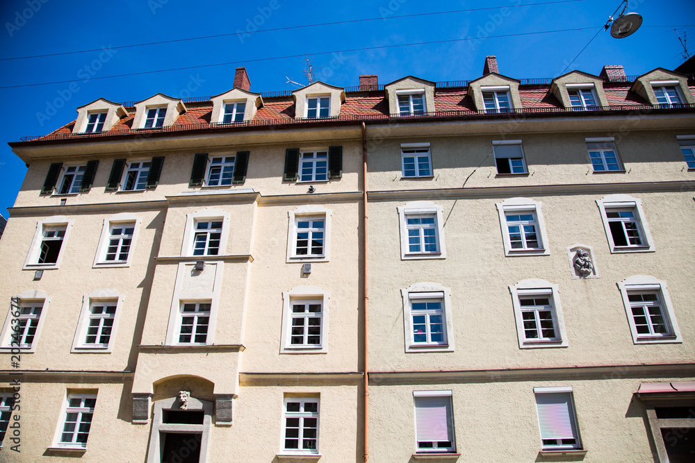 Residential houses in Munich, beautiful residential area, blue sky