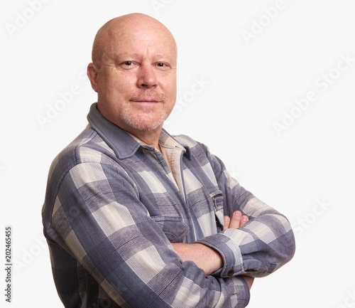 Confident senior man with hands crossed