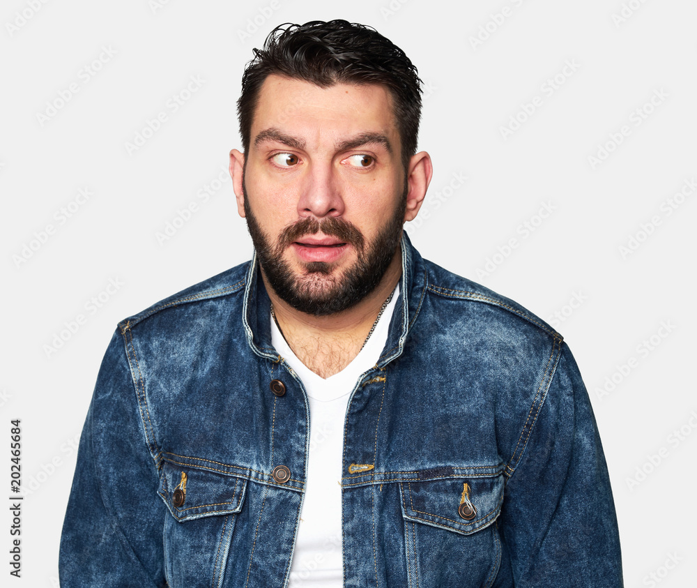 frightened bearded man looking aside frightened bearded man looking aside