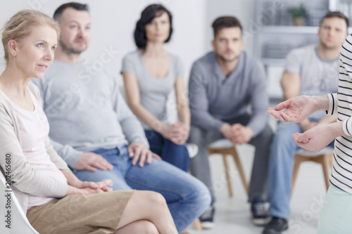 Group listening to woman