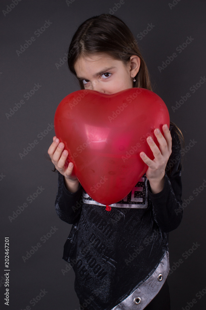 little cute girl posing with heart little cute girl posing with heart