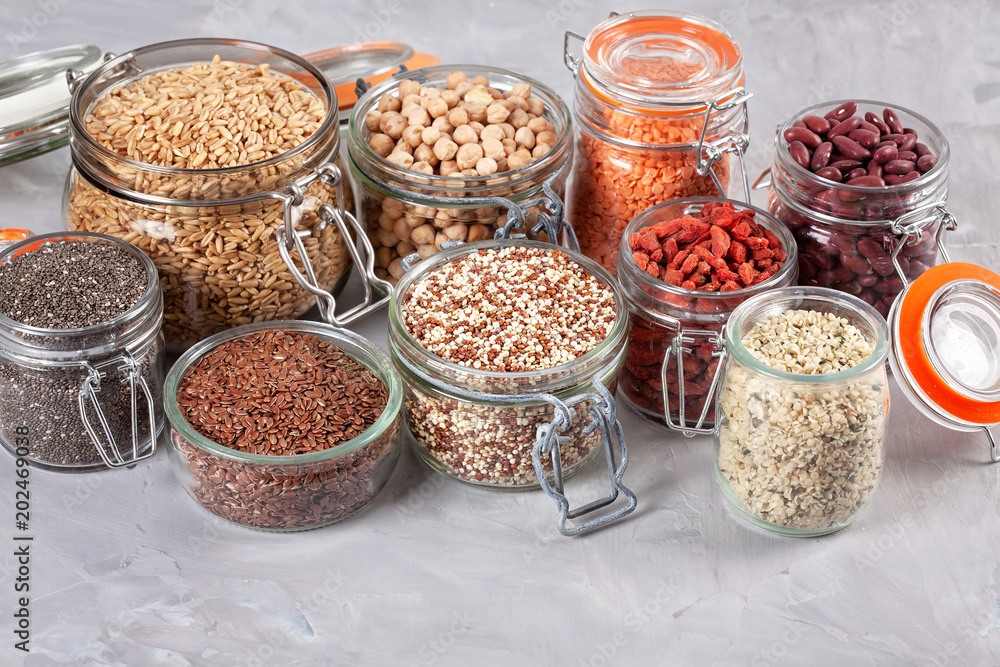 Various superfoods goji berries, quinoa, chia, hemp seeds, chickpeas, oats, linseeds and lantils. Vegan, vegetarian and healthy eating, balanced diet. Organic products concept Various superfoods goji berries, quinoa, chia, hemp seeds, chickpeas, oats, linseeds and lantils. Vegan, vegetarian and healthy eating, balanced diet. Organic products concept