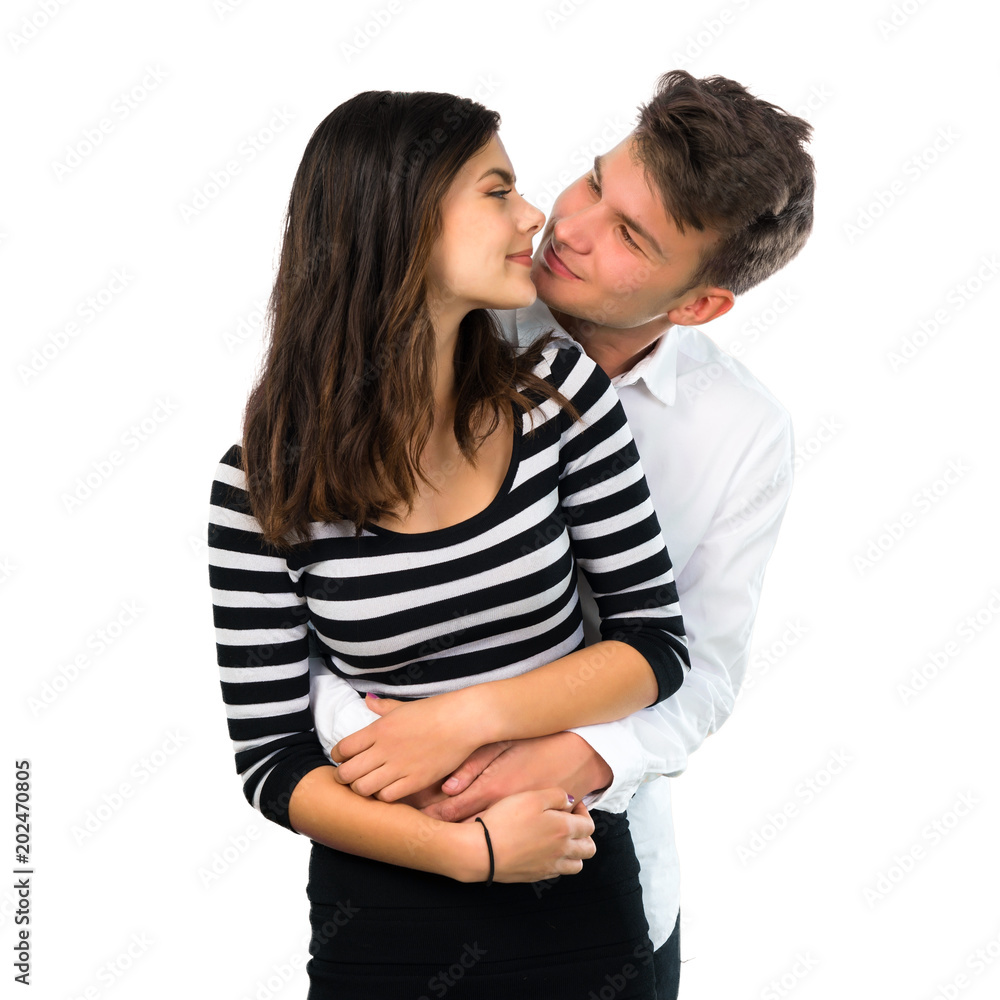 Young couple laughing on isolated white background Young couple laughing on isolated white background