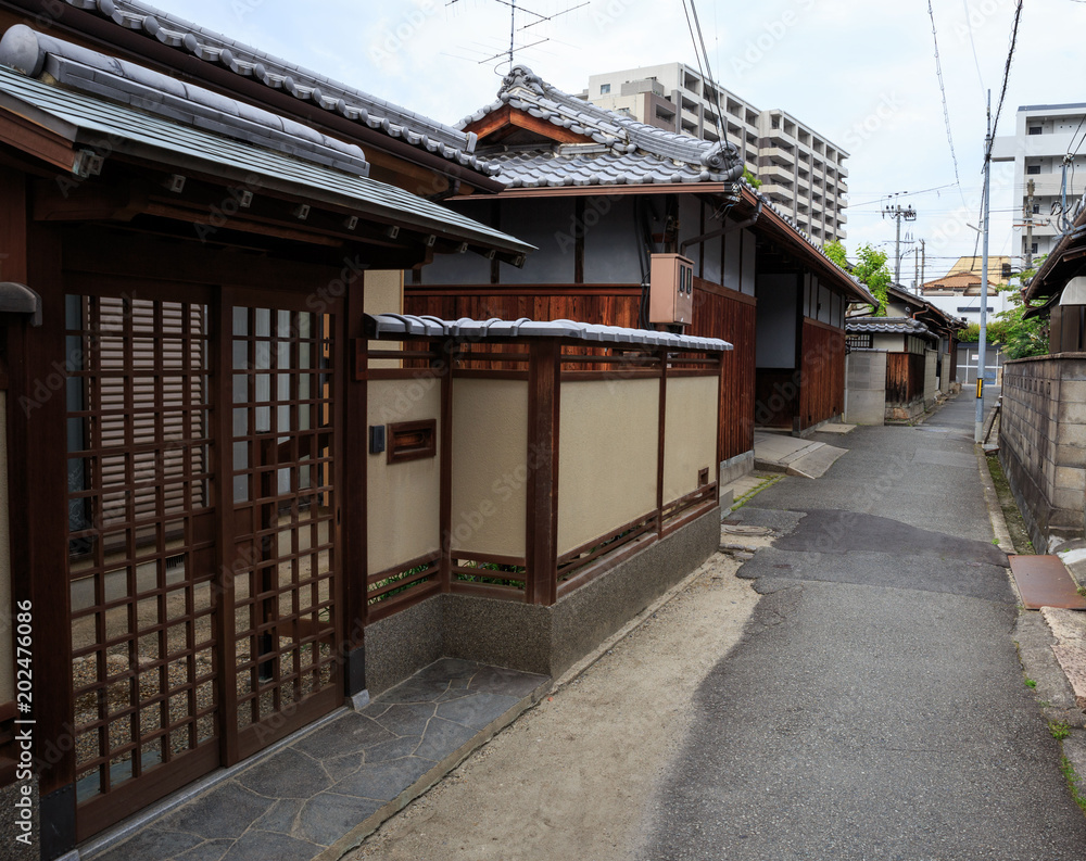 Narrow Japanese road with traditional wooden houses Narrow Japanese road with traditional wooden houses