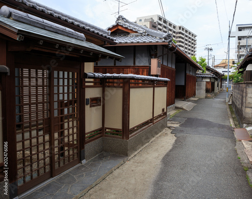 Narrow Japanese road with traditional wooden houses