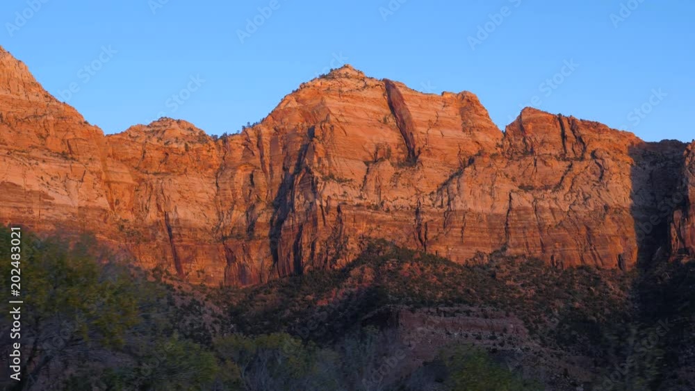 The Zion Park At Sunset With Red Rocks A View From The Car The Zion Park At Sunset With Red Rocks A View From The Car