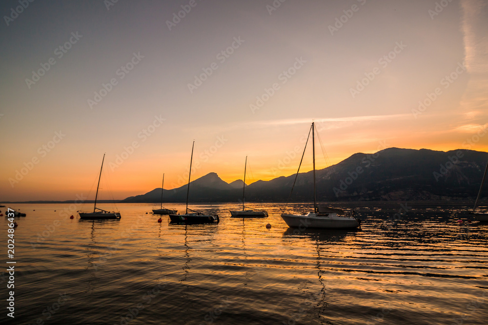 A harbor in Italy by night on Garda Lake