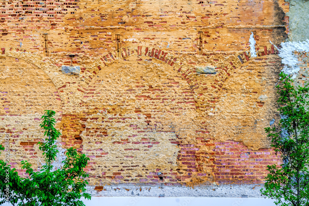 Fototapeta premium red brick wall on the abandoned old factory