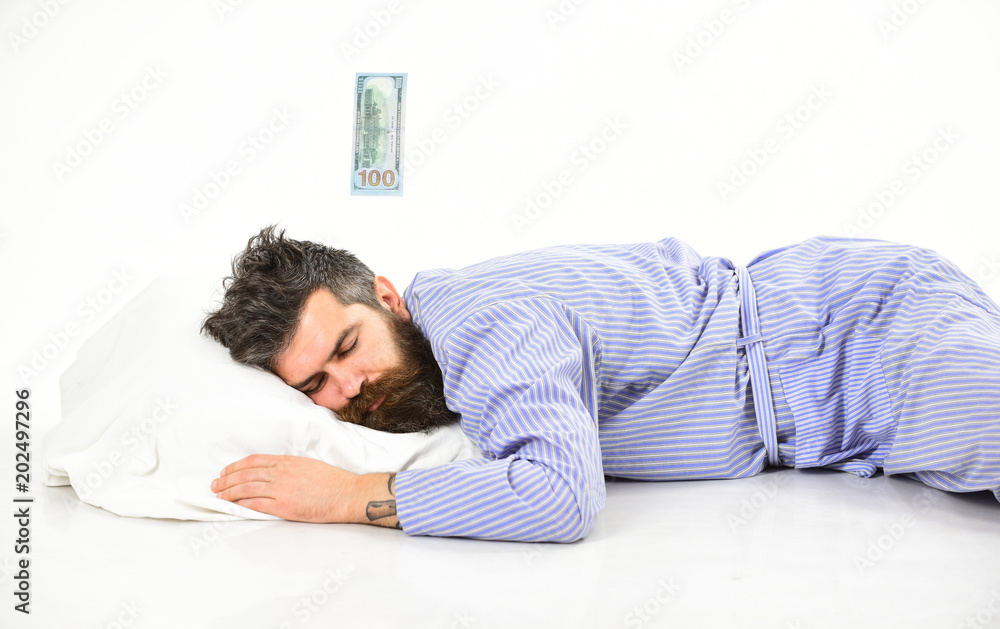 Man, businessman sleeps with banknote above head