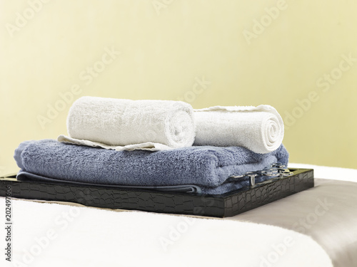 towels placed on a tray for massage in beauty spa © imtmphoto
