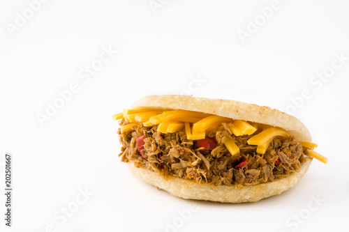 Arepa with shredded beef and cheese isolated on white background. Venezuelan typical food. Copyspace

 photo
