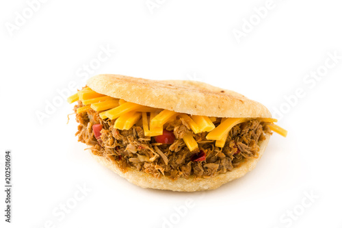 Arepa with shredded beef and cheese isolated on white background. Venezuelan typical food

