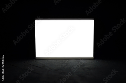 Mock up luminous display in the dark. Place for text or your design.