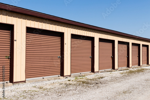 Brown numbered self storage and mini storage garage units III