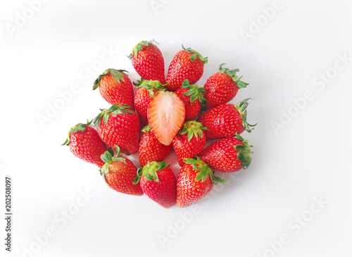 Freshness strawberries series - round shape of Strawberries with leaves. Isolated on a white background.