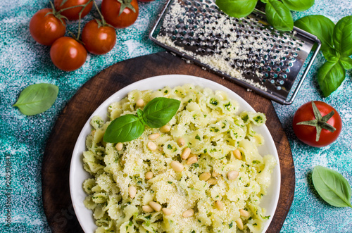 Traditional Italian pasta with pesto photo