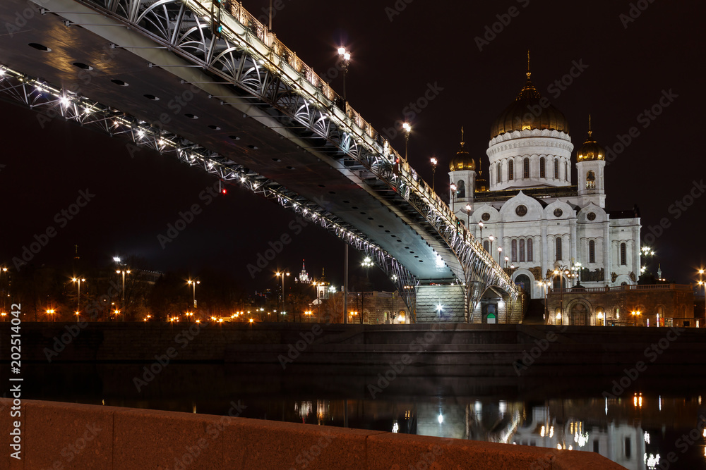 Cathedral of Christ the Saviour in Moscow on the background of the Patriarshiy bridge at night