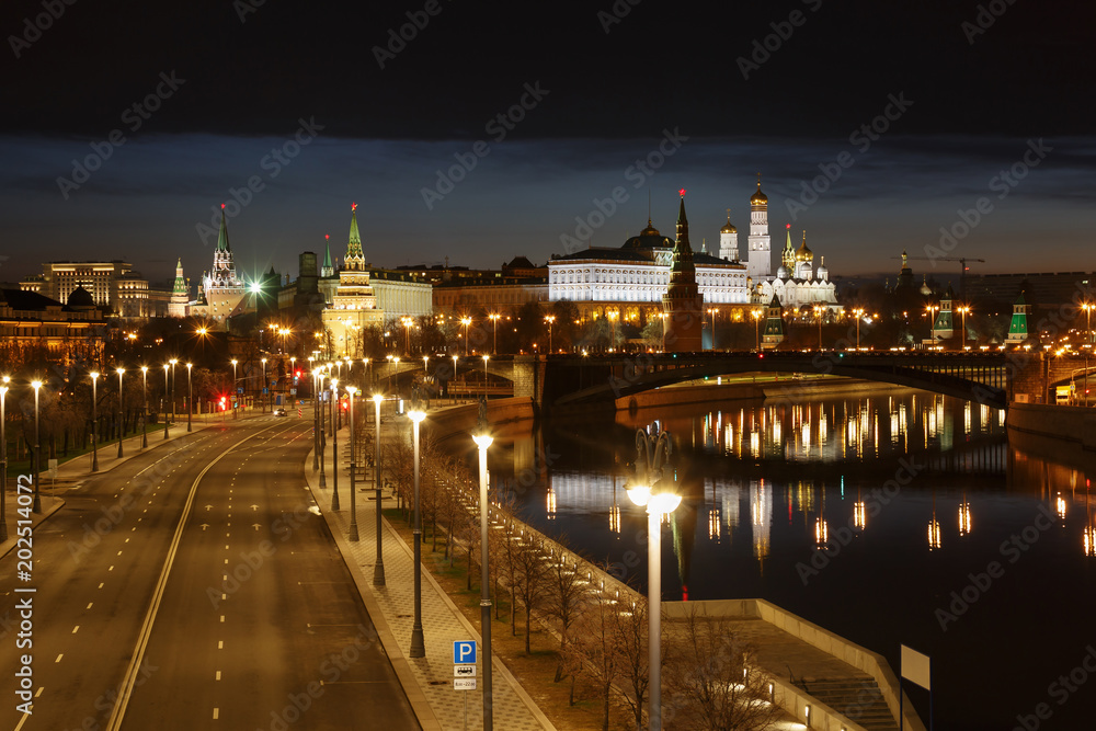 Moscow Kremlin at night on the background of Prechistenskaya embankment