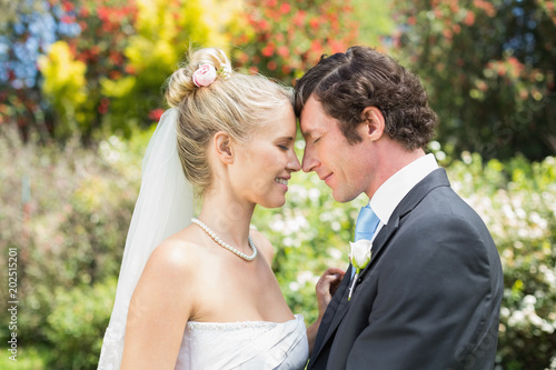 Pretty wife touching noses with new husband © WavebreakmediaMicro