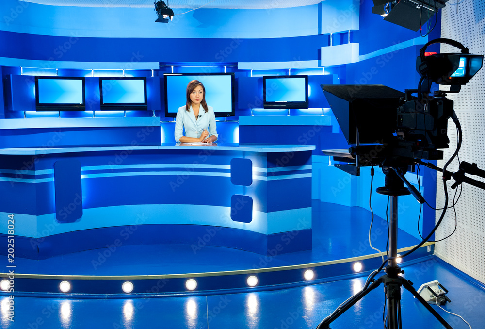 television newscaster at blue TV studio - obrazy, fototapety, plakaty 