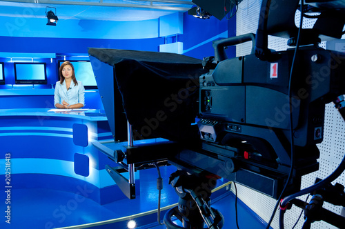 TV anchorwoman at TV studio photo