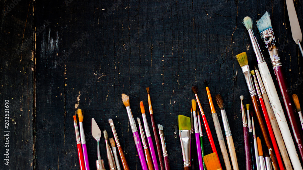 Artist paint brushes background. Artist paint brushes background.