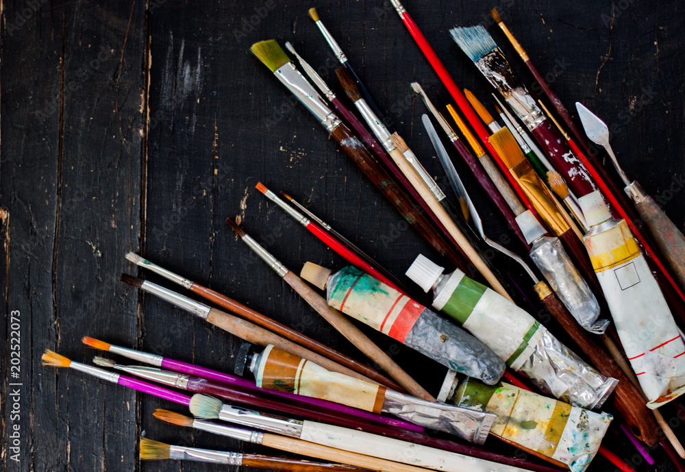 Obraz premium Artist paint brushes background.