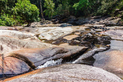 Mountain river flowing through rocks and stones. photo