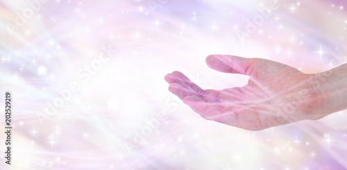 Woman presenting with her hand against glowing background