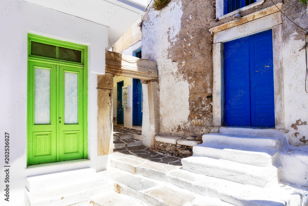 Old narrow streets with colorful doors. Naxos island, Greece