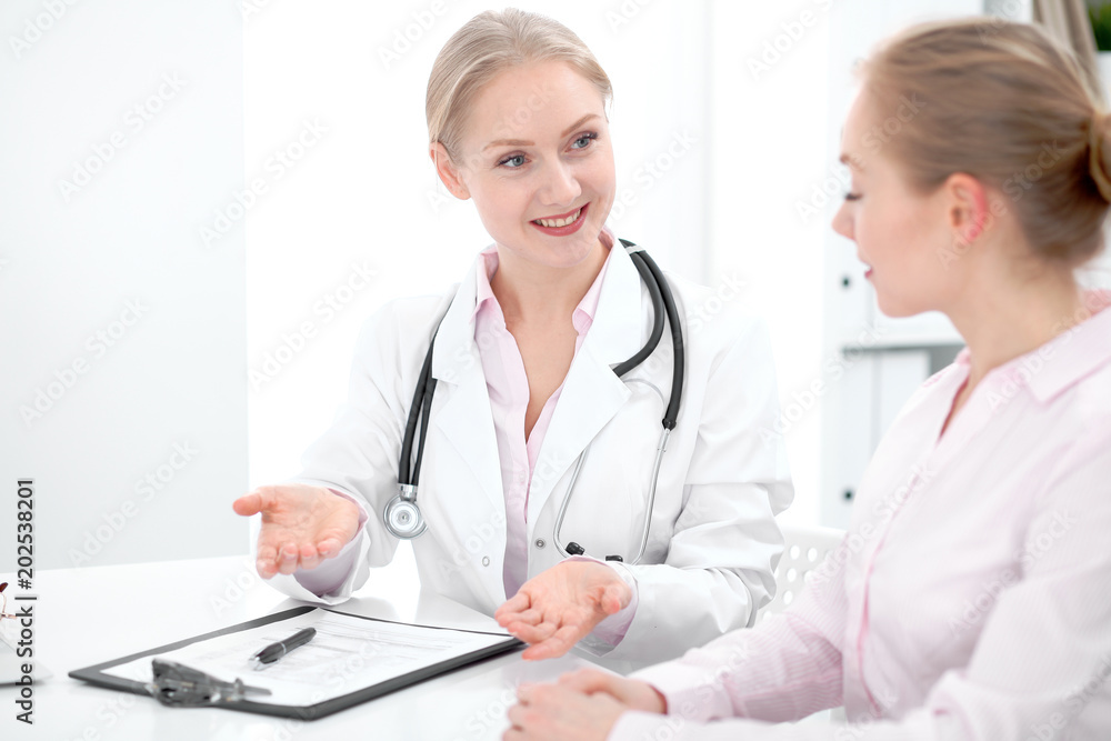 Doctor and patient during personal consulting in hospital Doctor and patient during personal consulting in hospital
