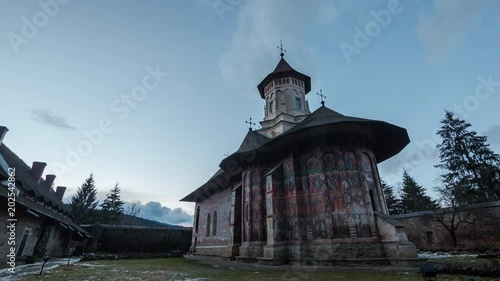  Moldovita Monastery at sunrise, timelapse  photo