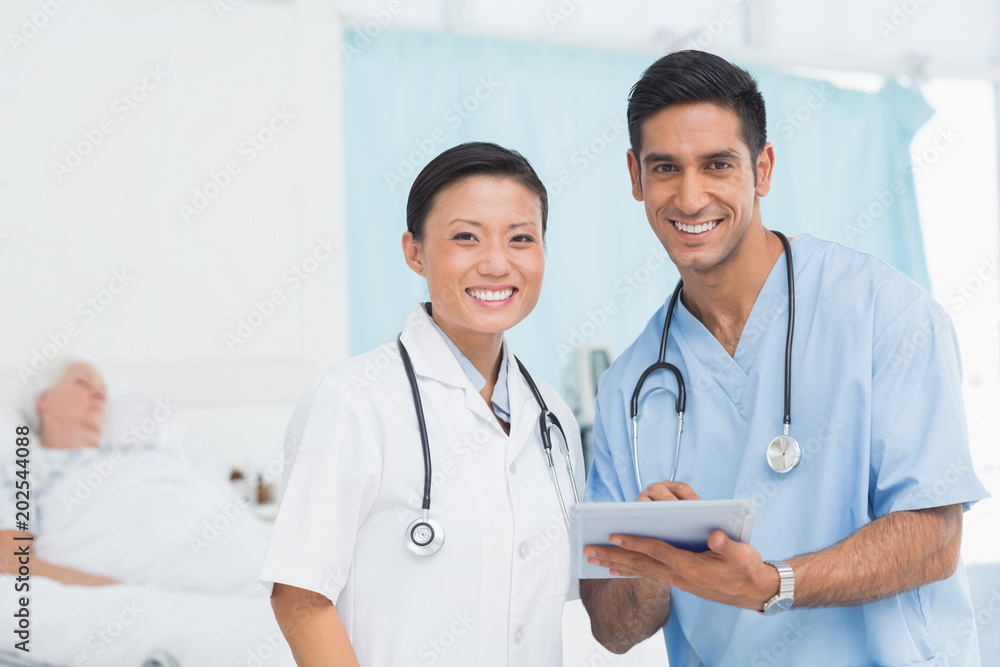 Portrait of confident doctors with arms crossed Portrait of confident doctors with arms crossed