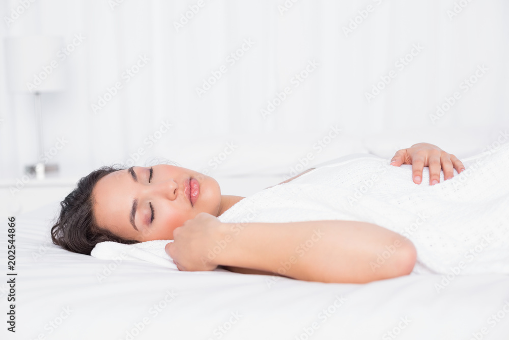 Pretty woman sleeping with eyes closed in bedroom Pretty woman sleeping with eyes closed in bedroom