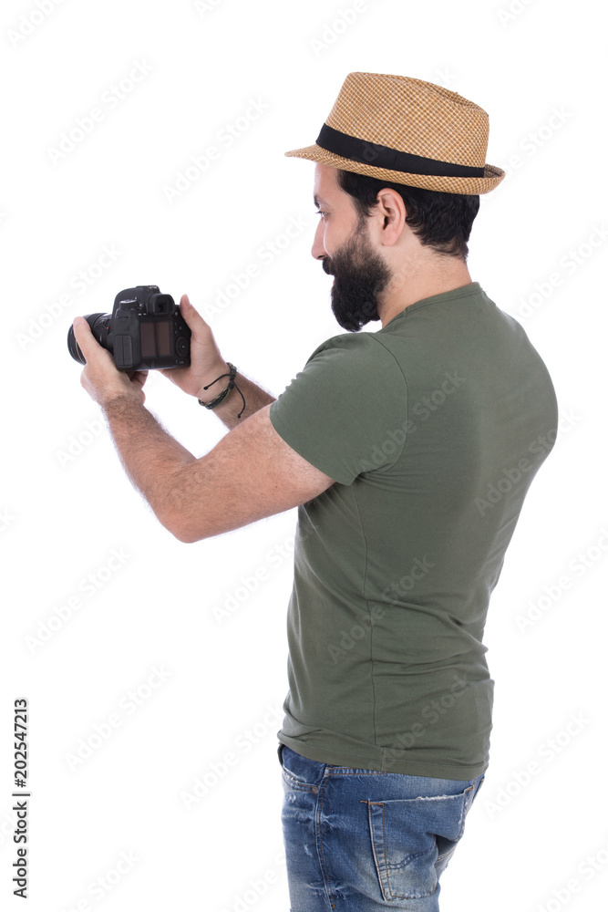 looking at the photos in the camera looking at the photos in the camera