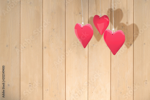 Love hearts against wooden planks