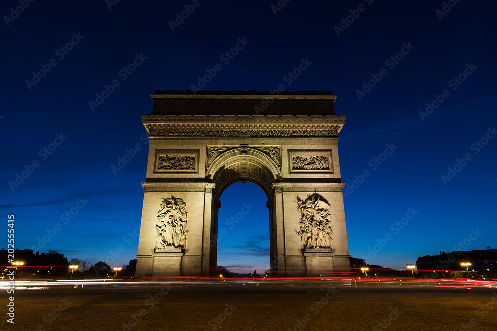 Arc De Triomphe in Paris, France at night