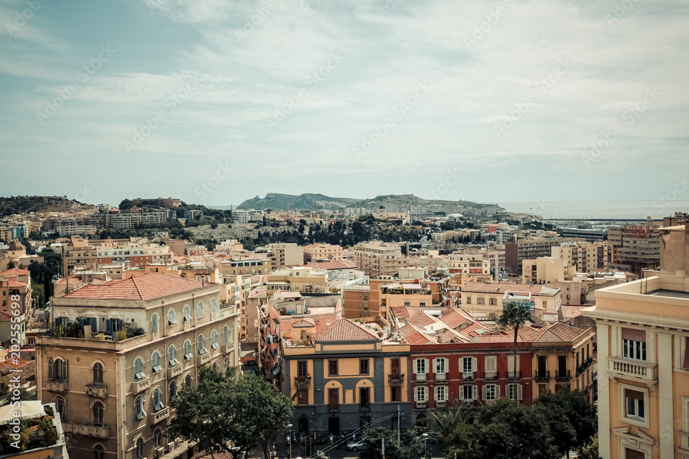 Italy Cagliari city, historical center houses and parks, europe vacations, summer landmarks buildings and trees