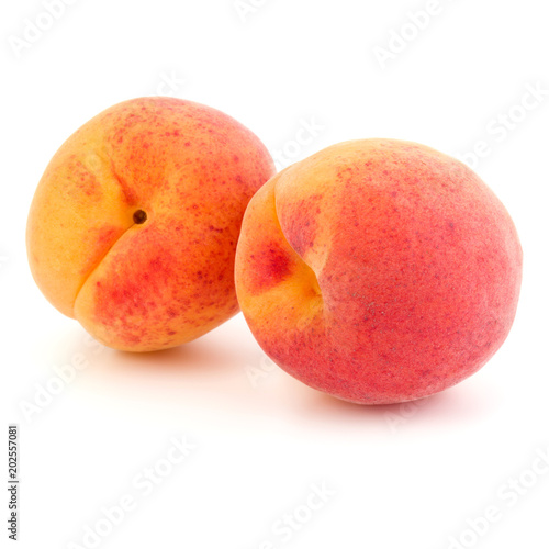 Two apricot fruit isolated on white background cutout