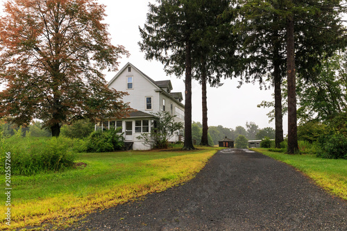 Long driveway to large rural American home