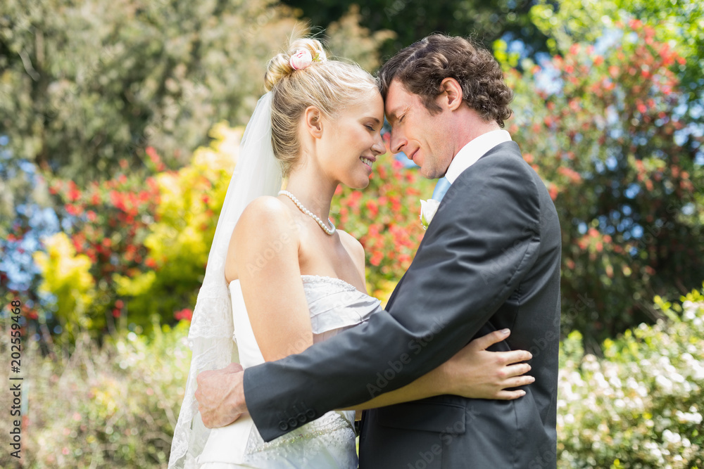 Pretty wife embracing her new husband Pretty wife embracing her new husband