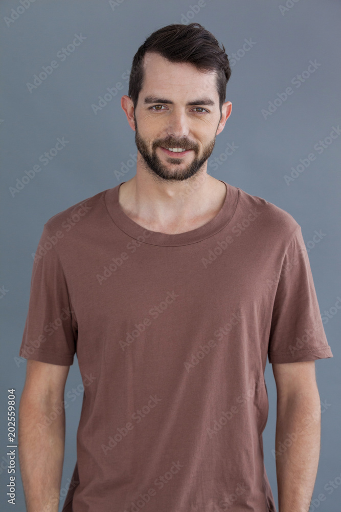 Handsome man in brown t-shirt Handsome man in brown t-shirt