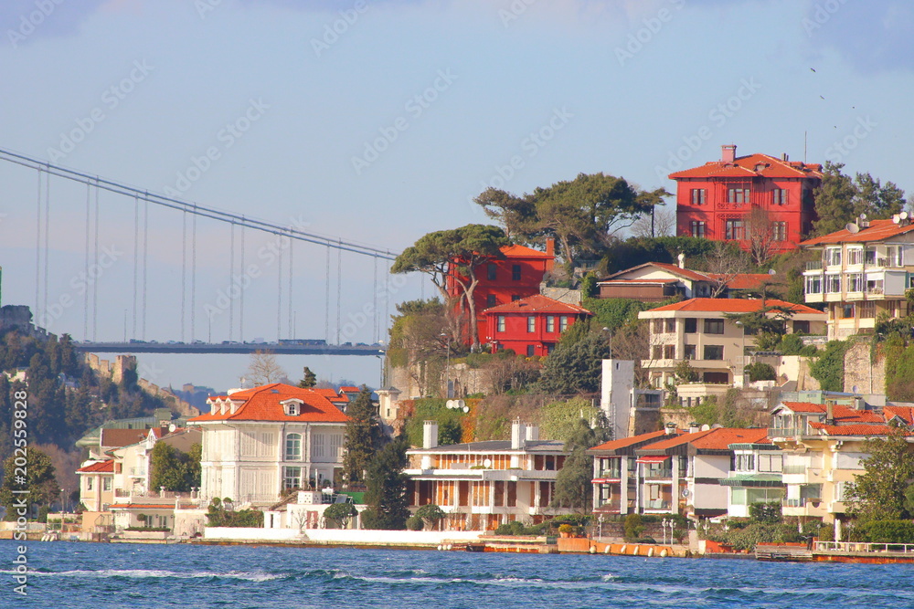 Houses near the Bosphorus and Fatih Sultan Mehmet Bridge